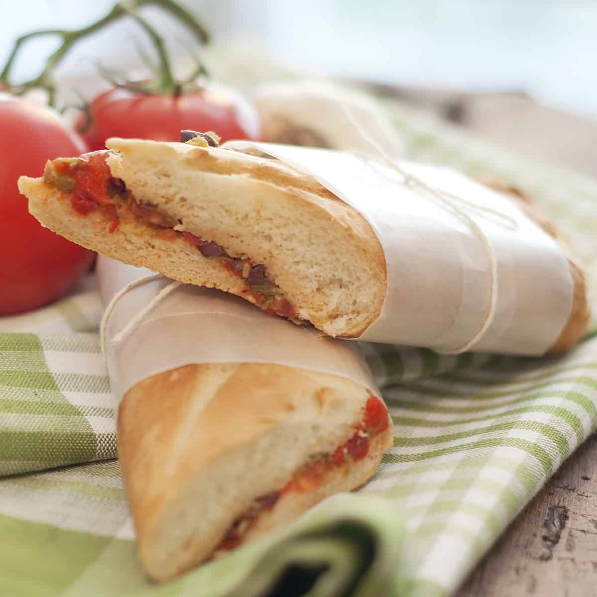 This Mediterranean Pressed Sandwich with its lovely bright flavors is just perfect for a late summer picnic. https://www.lanascooking.com/mediterranean-pressed-sandwich/