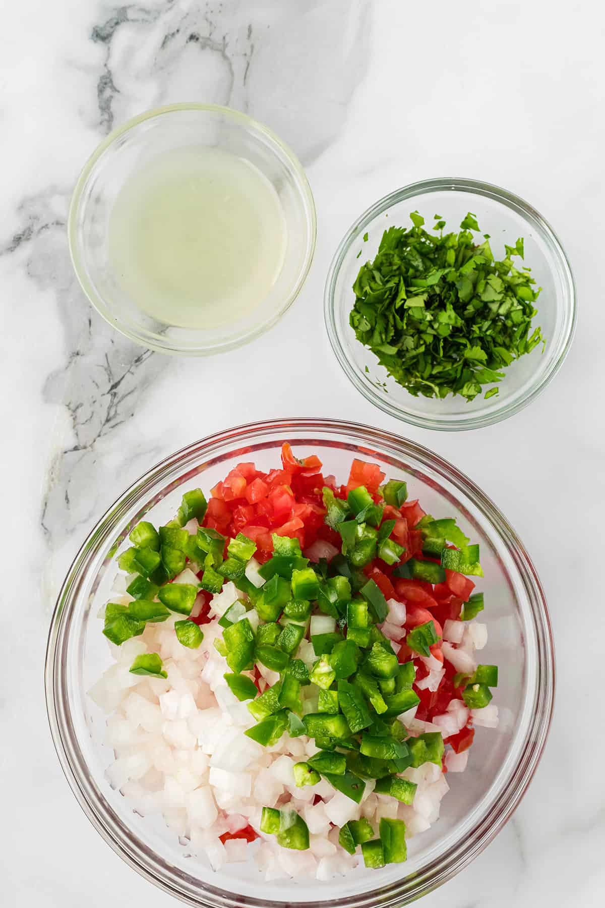 Adding ingredients to a mixing bowl.