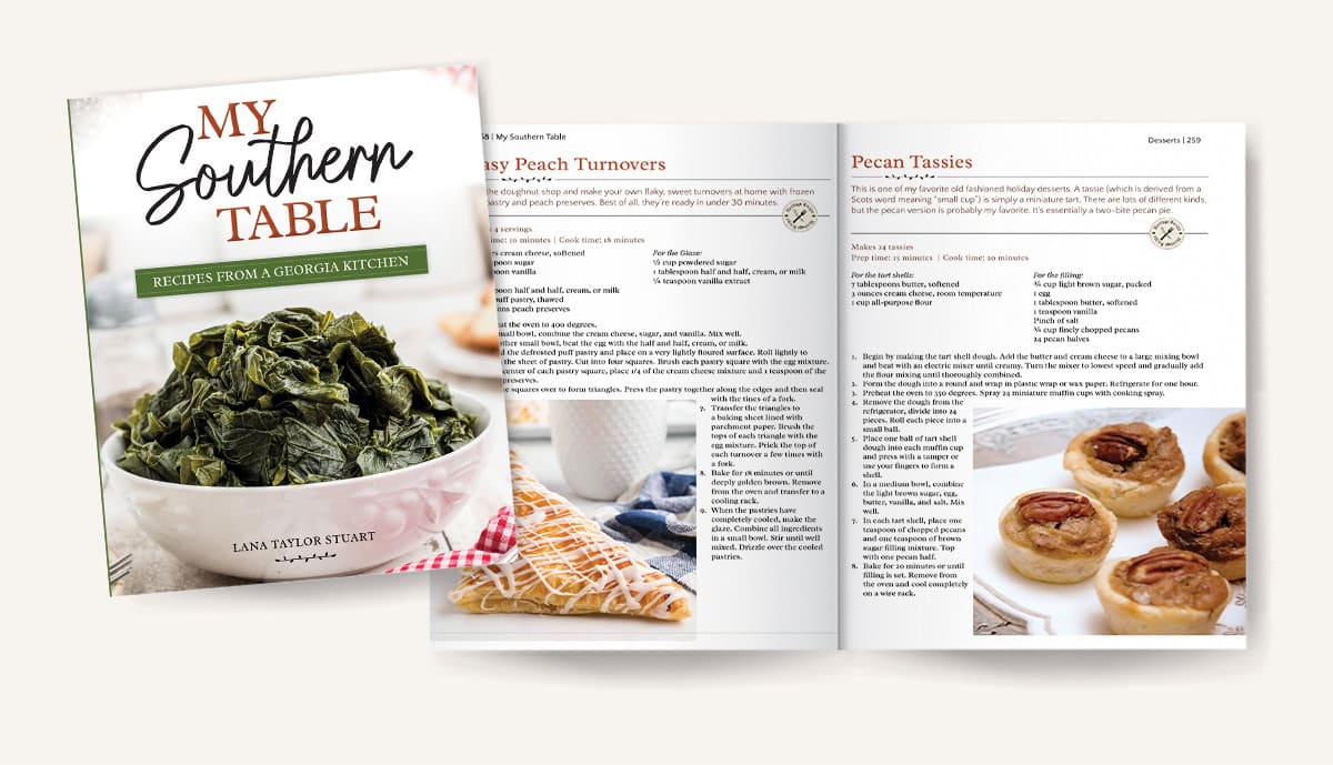 A cookbook titled My Southern Table with pages open to recipes and photos of peach turnovers and pecan tassies.