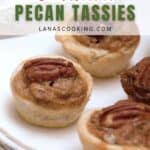 Three Southern pecan tassies topped with pecan halves on a white plate, with text overlay above them.