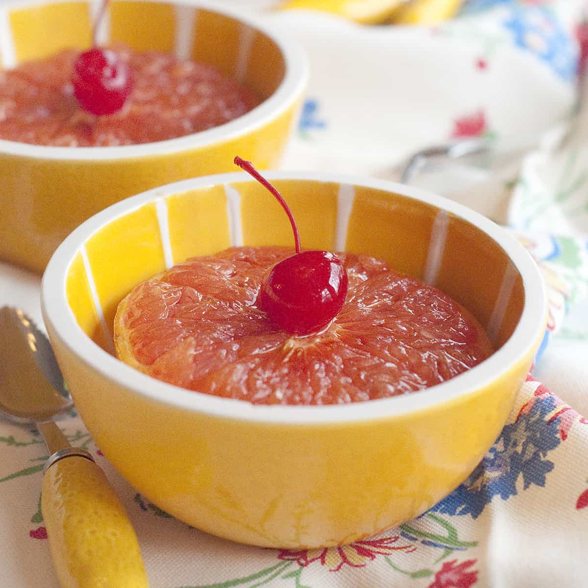 Broiled Grapefruit - grapefruit, cherry juice, and brown sugar broiled until the lightly browned and the grapefruit is warm. Great for breakfast or brunch. https://www.lanascooking.com/broiled-grapefruit/