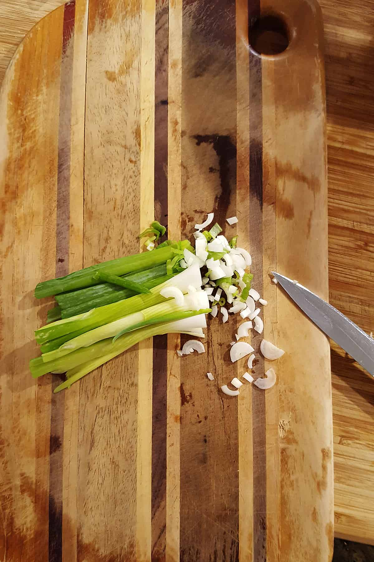 Chopping green onions for Lemon Dill Potato Salad