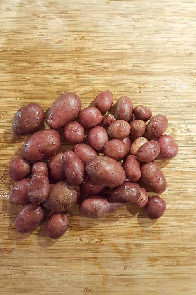 Wash the potatoes to remove any dirt
