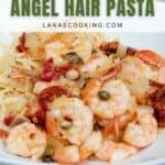 Plate of Mediterranean shrimp and angel hair pasta topped with onions, capers, and tomatoes, served next to shredded cheese, with a text overlay describing the dish.