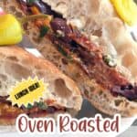 Close-up of an oven roasted tomato sandwich with herbs, cheese, and ciabatta bread, garnished with pepperoncini. Text overlay reads “Oven Roasted Tomato Sandwich.”.