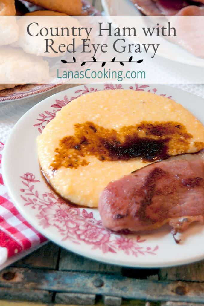 Country Ham with Red Eye Gravy - Salty, dry cured country ham with red eye gravy flavored with strong black coffee served with a side of cheese grits. https://www.lanascooking.com/country-ham-with-red-eye-gravy/
