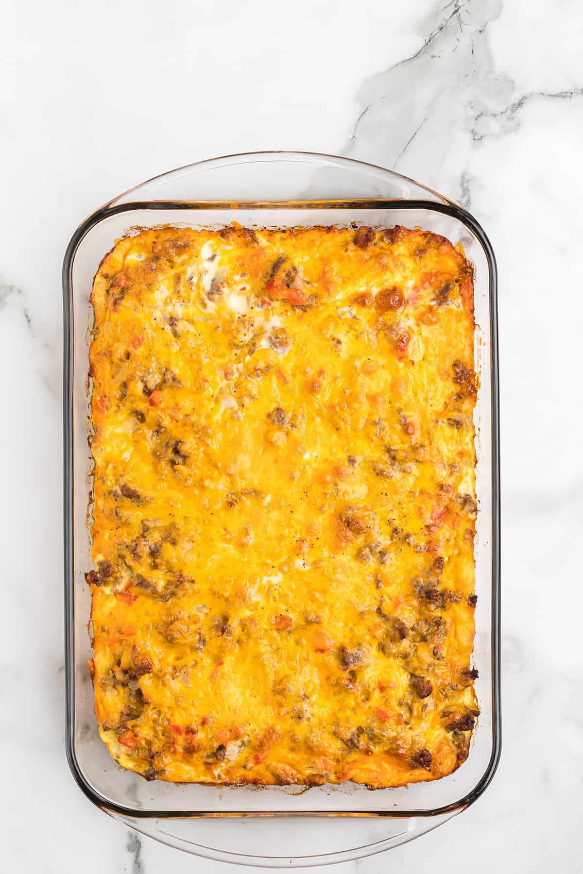 Baked casserole in a glass dish.