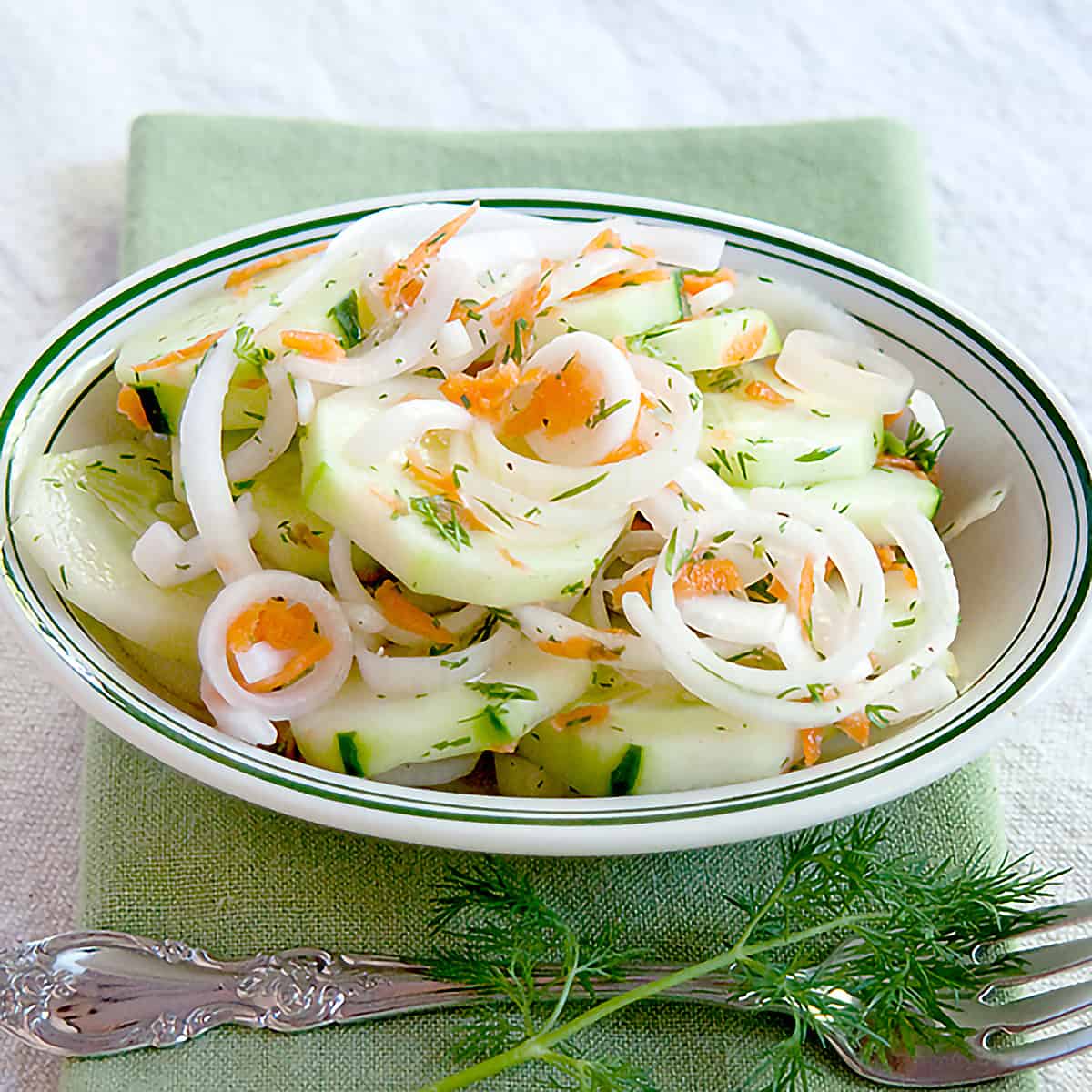 Sweet and Sour Cucumber and Vidalia Onion Salad - This cucumber and Vidalia onion salad is light, refreshing, and perfect for springtime. https://www.lanascooking.com/sweet-and-sour-cucumber-and-vidalia-onion-salad/