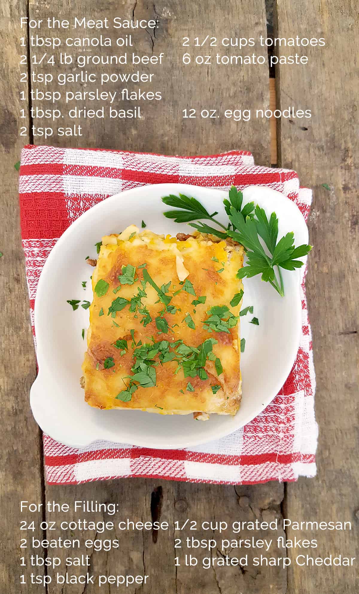 A serving of egg noodle lasagna on a plate atop a napkin on a rough wooden board; overlay shows ingredients needed for the recipe.