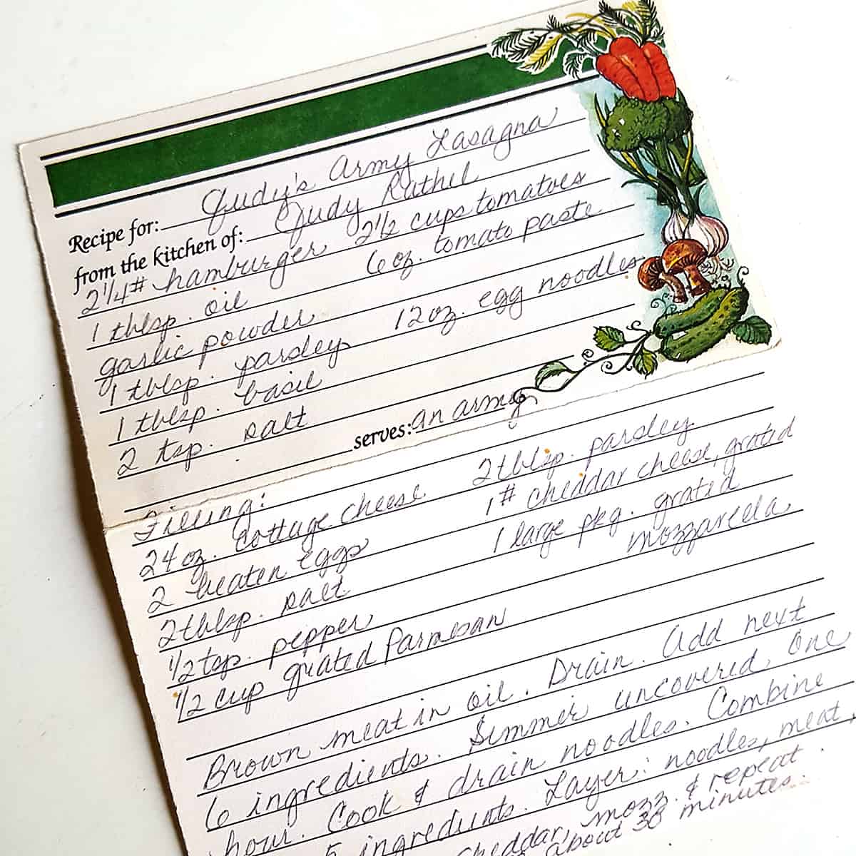 Photo of the handwritten recipe for "Judy's Army Lasagna."