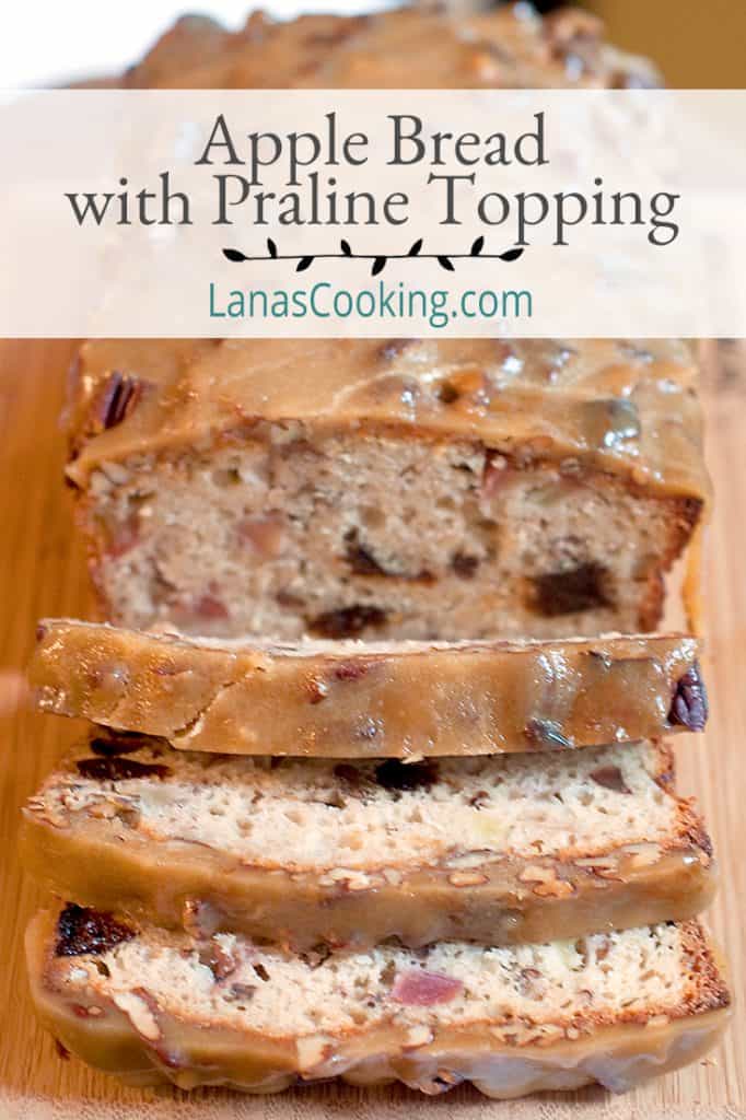 Apple Bread with Praline Topping sliced and presented on a cutting board. Text Overlay: Apple Bread with Praline Topping