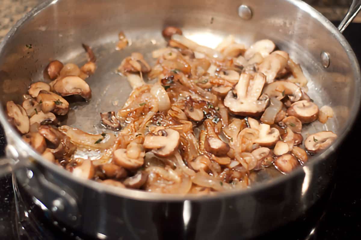 Caramelized onions and mushrooms in a skillet