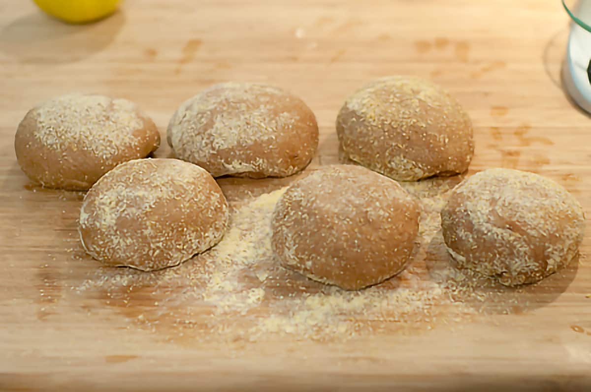Dough formed into balls and rolled in cornmeal.