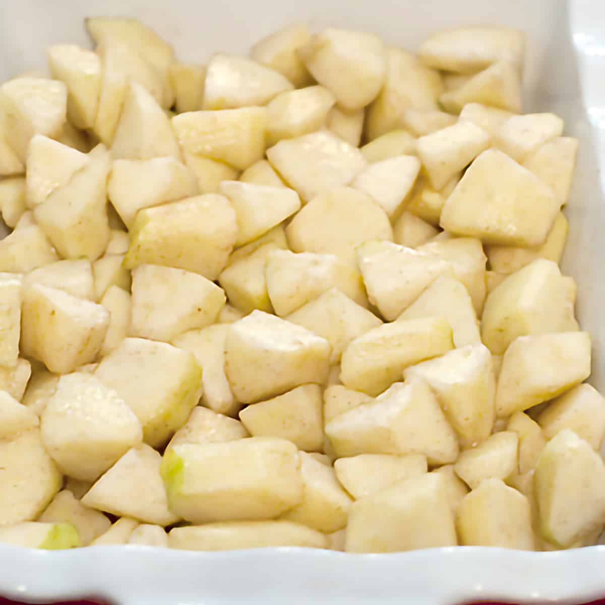 Prepared apples in a baking dish