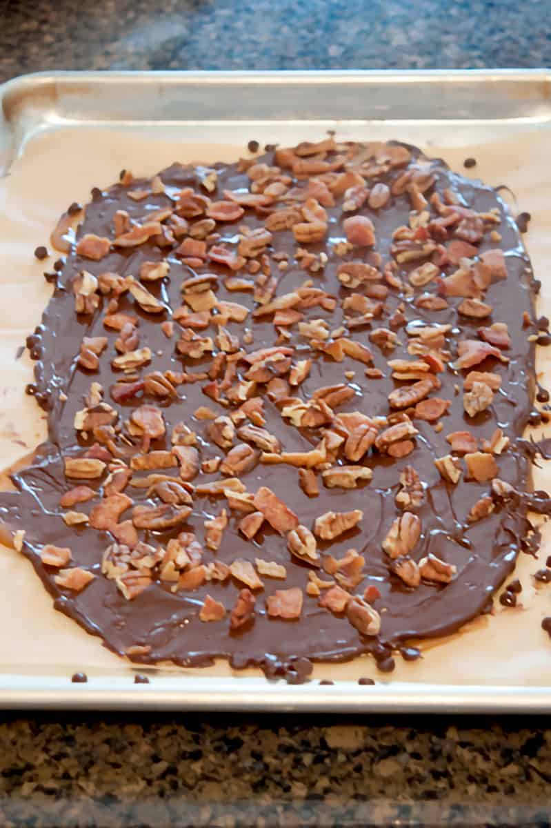Chocolate layer topped with toasted pecans and crumbled bacon.