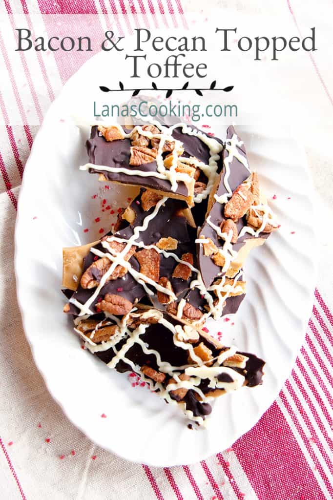 Pieces of bacon and pecan topped toffee on a serving plate. Text overlay for pinning.