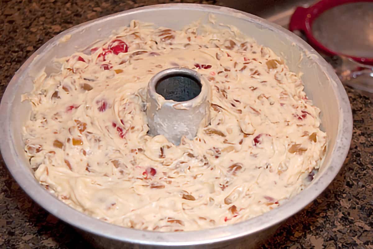Finished fruitcake batter in the prepared pan.