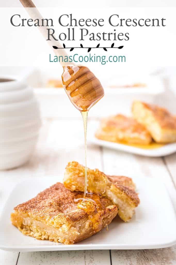 A serving of cream cheese filled crescent roll pastries being drizzled with honey. Text overlay for pinning.