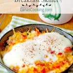 Hash Brown Omelet Skillets on a kitchen towel with a cup of coffee in the background. Text overlay for pinning.