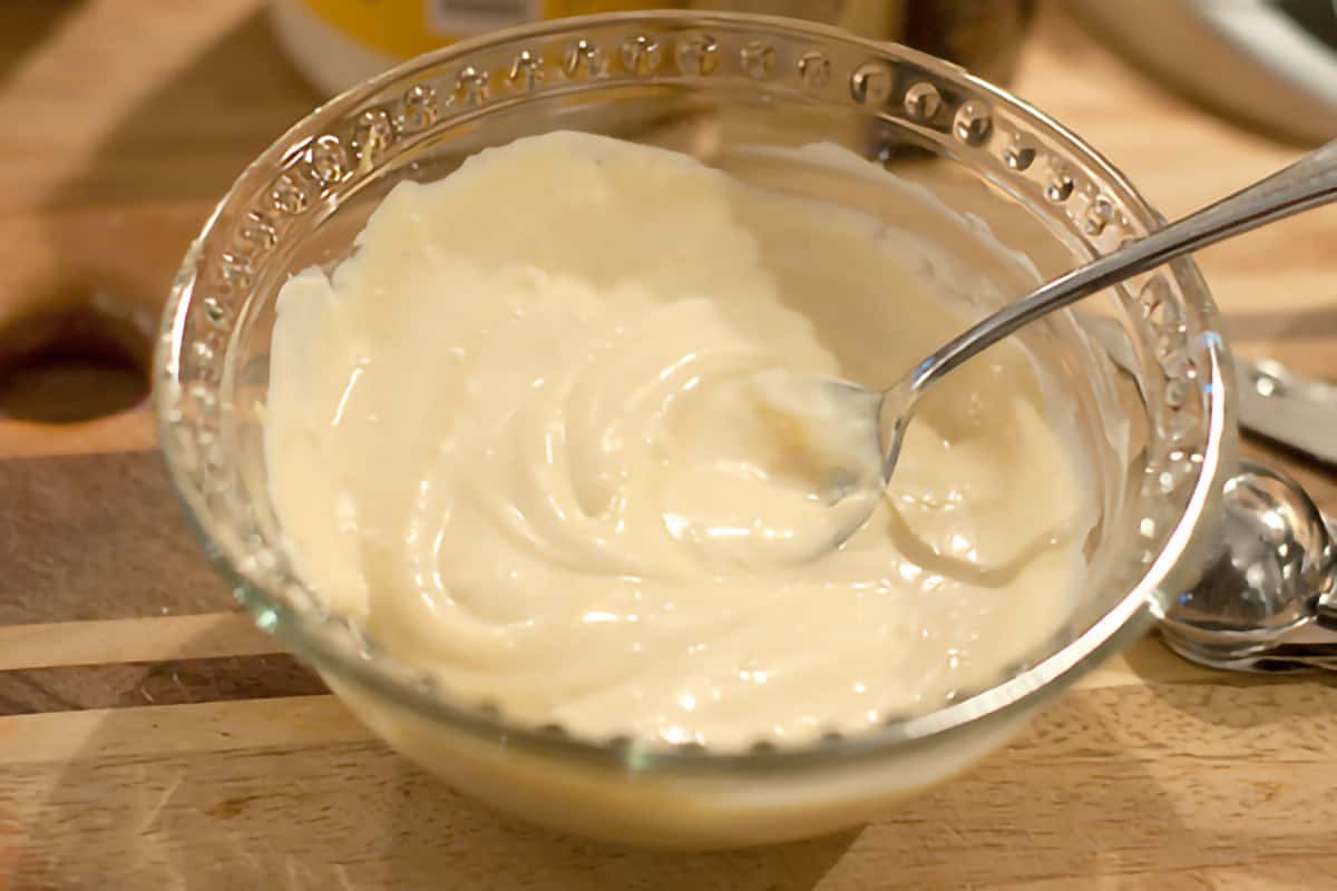 Small bowl containing the dijon-mayonnaise mixture.