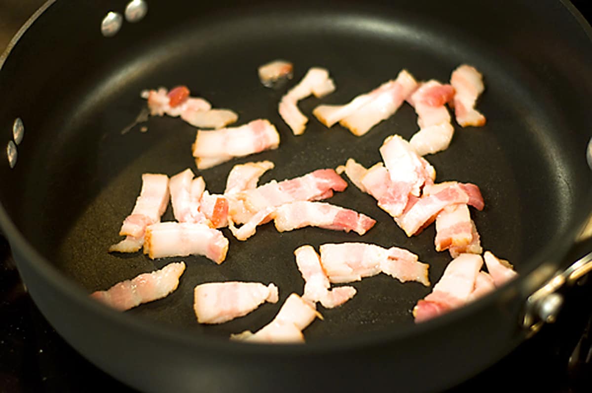 Bacon cooking in a skillet