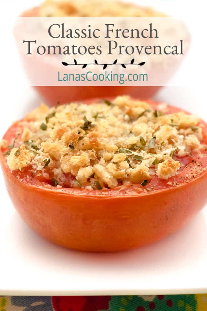 Tomatoes topped with breadcrumbs and herbs on a serving plate.