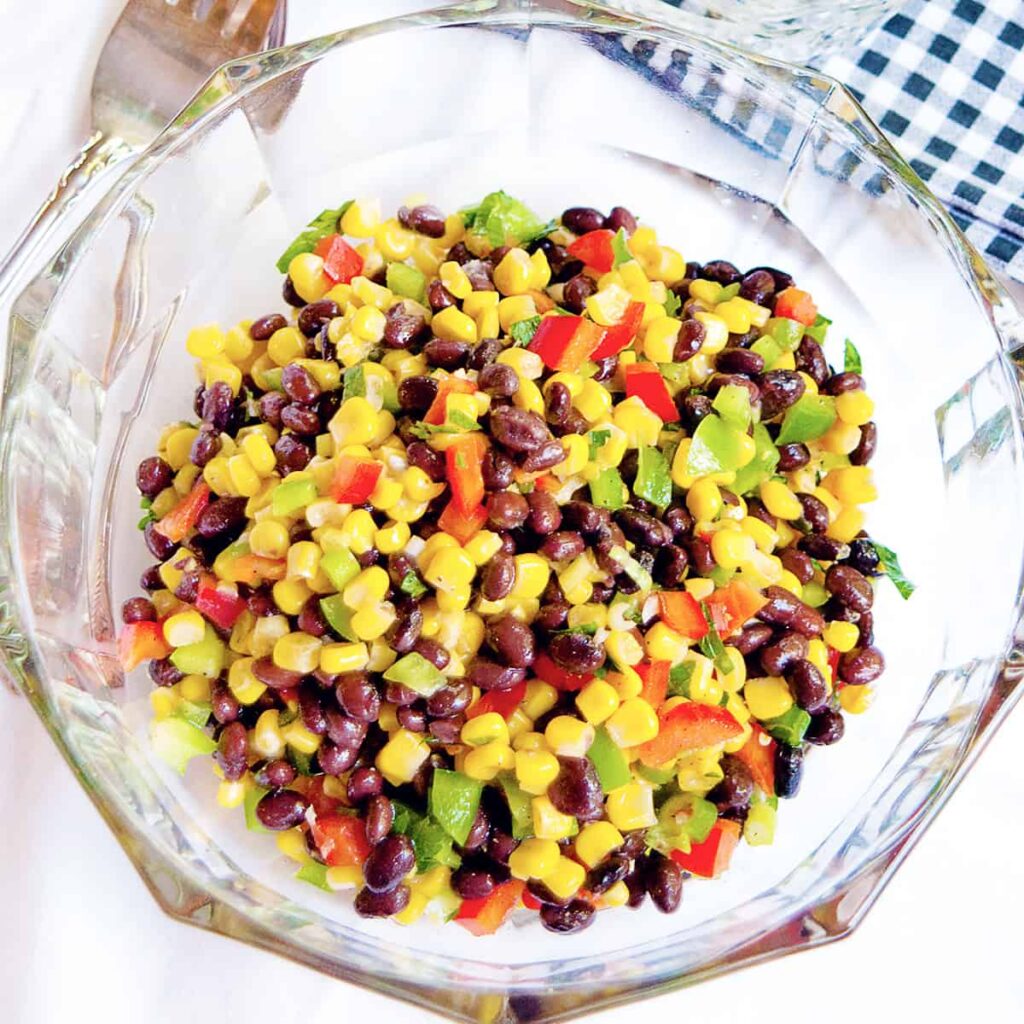 Black Bean and Corn Salad in a glass serving bowl.