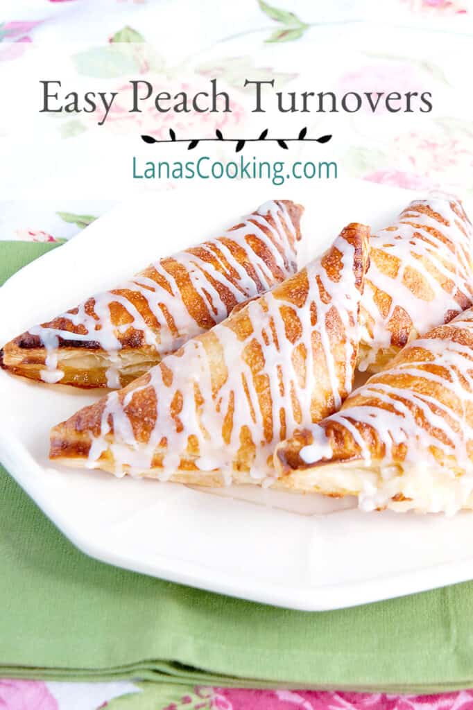 Easy Peach Turnovers on a white serving plate.