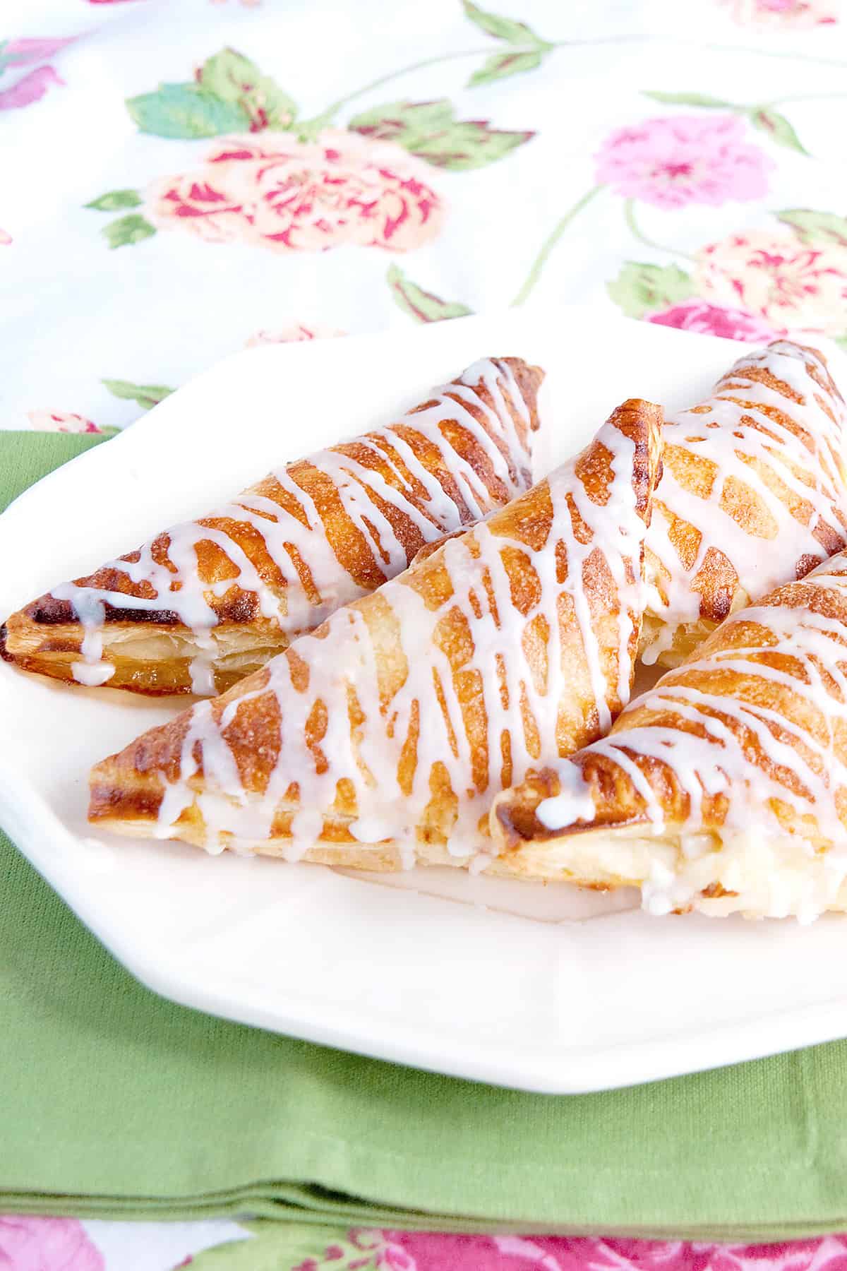Easy Peach Turnovers on a white serving plate.
