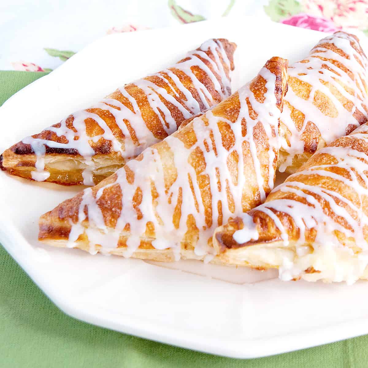 Easy Peach Turnovers on a white serving plate.