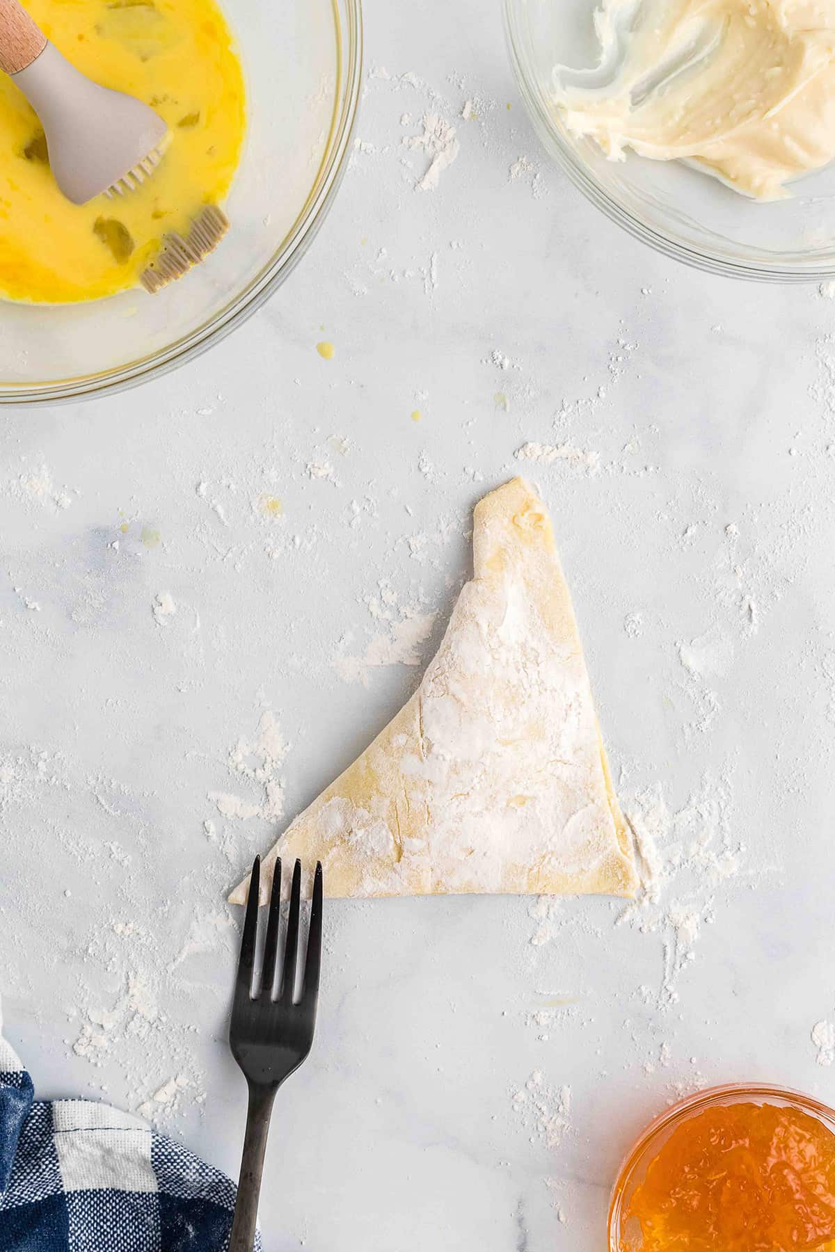 Crimping edges of the pastry.