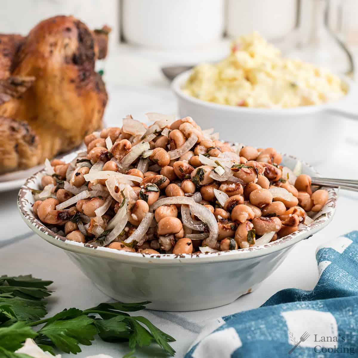 Finished salad in a white bowl.