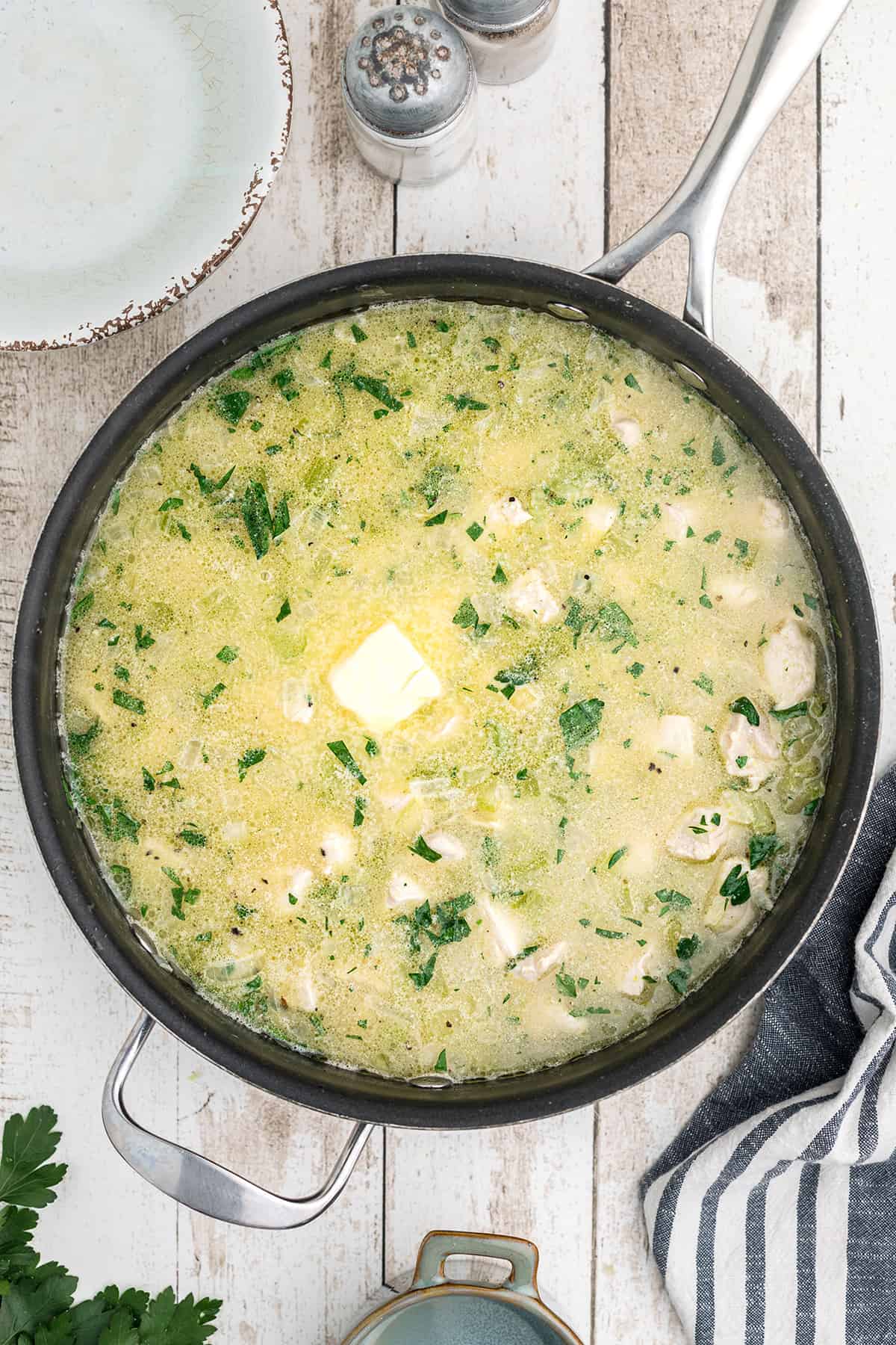 Remaining butter added to the skillet.