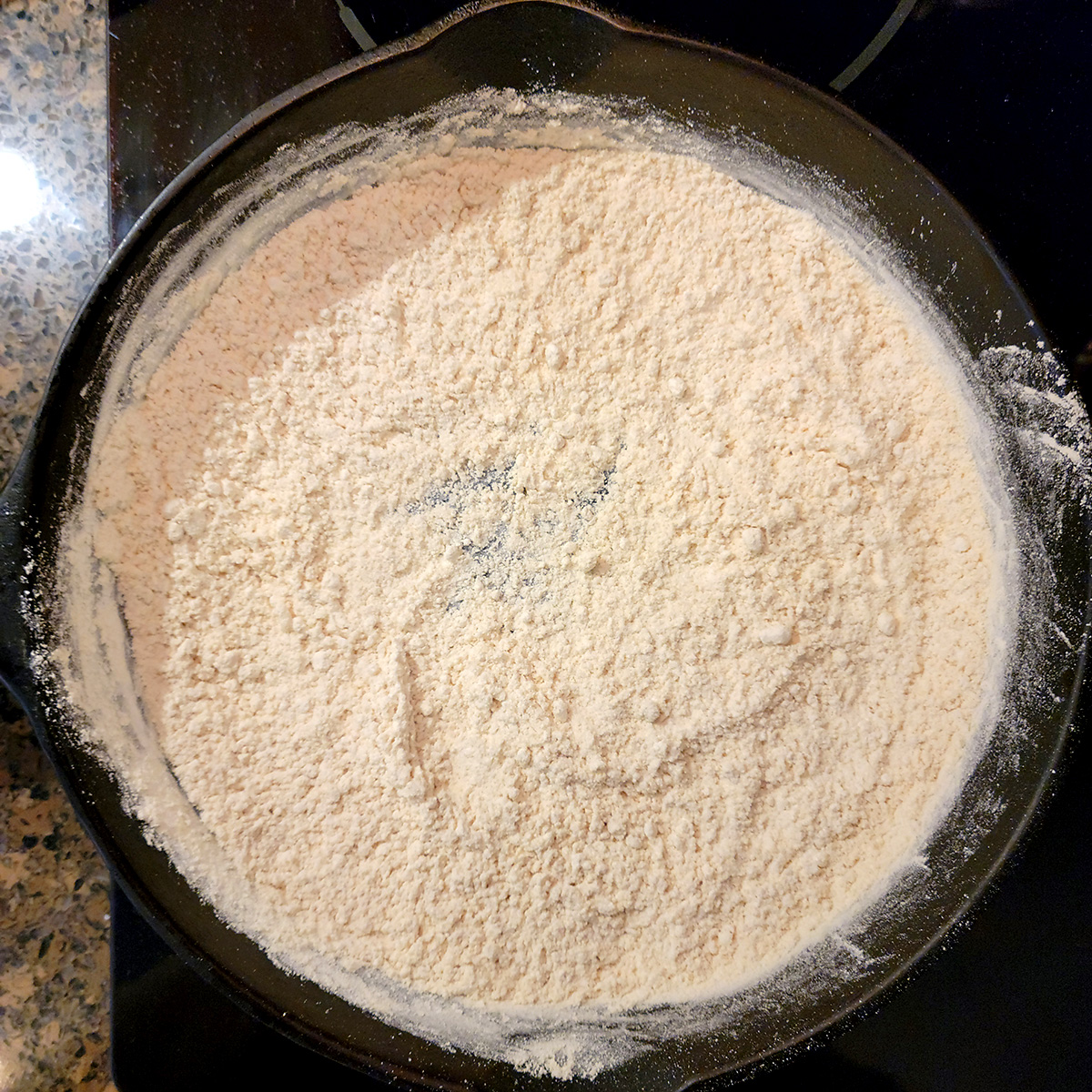 Cooked flour in cast iron skillet.
