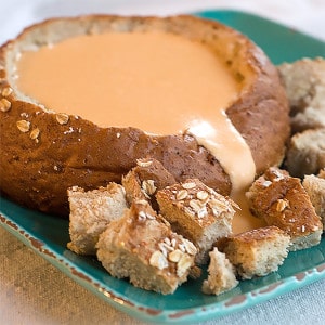 Cheese dip in a bread bowl.