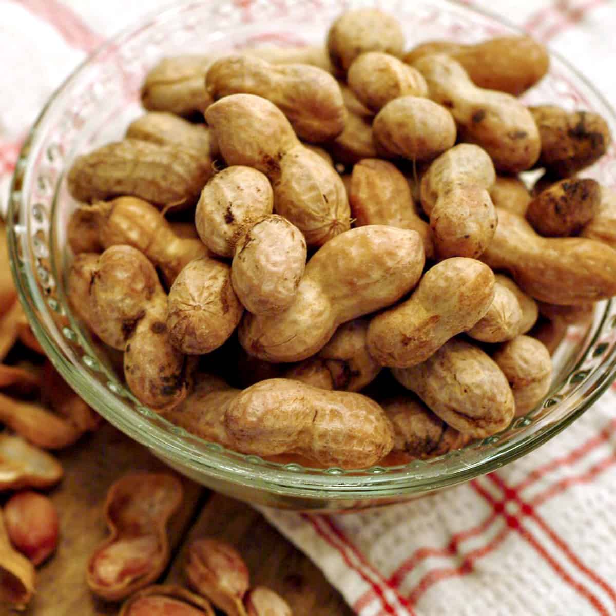 Boiled peanuts in a glass bowl.