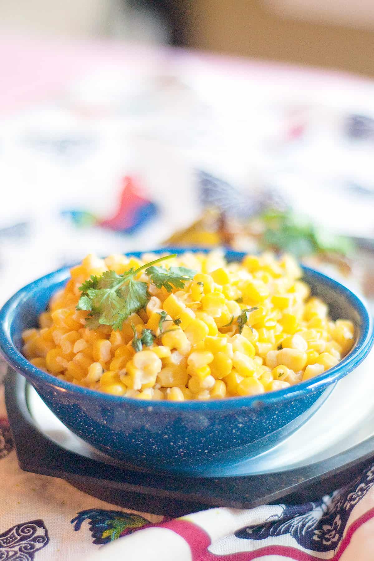 Mexican Street Corn Salad in a blue bowl.