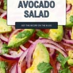 Sliced avocado, tomato, and red onion salad topped with cilantro; text overlay promotes this fresh tomato and avocado salad recipe on a blog.