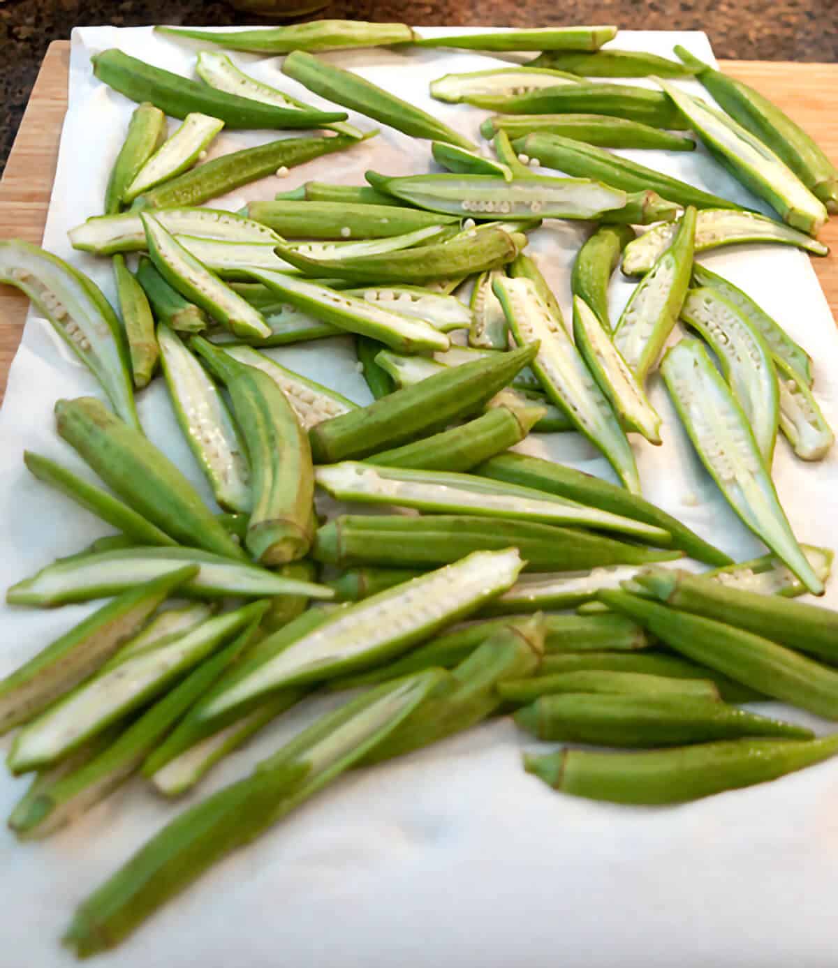 Okra draining on paper towels.