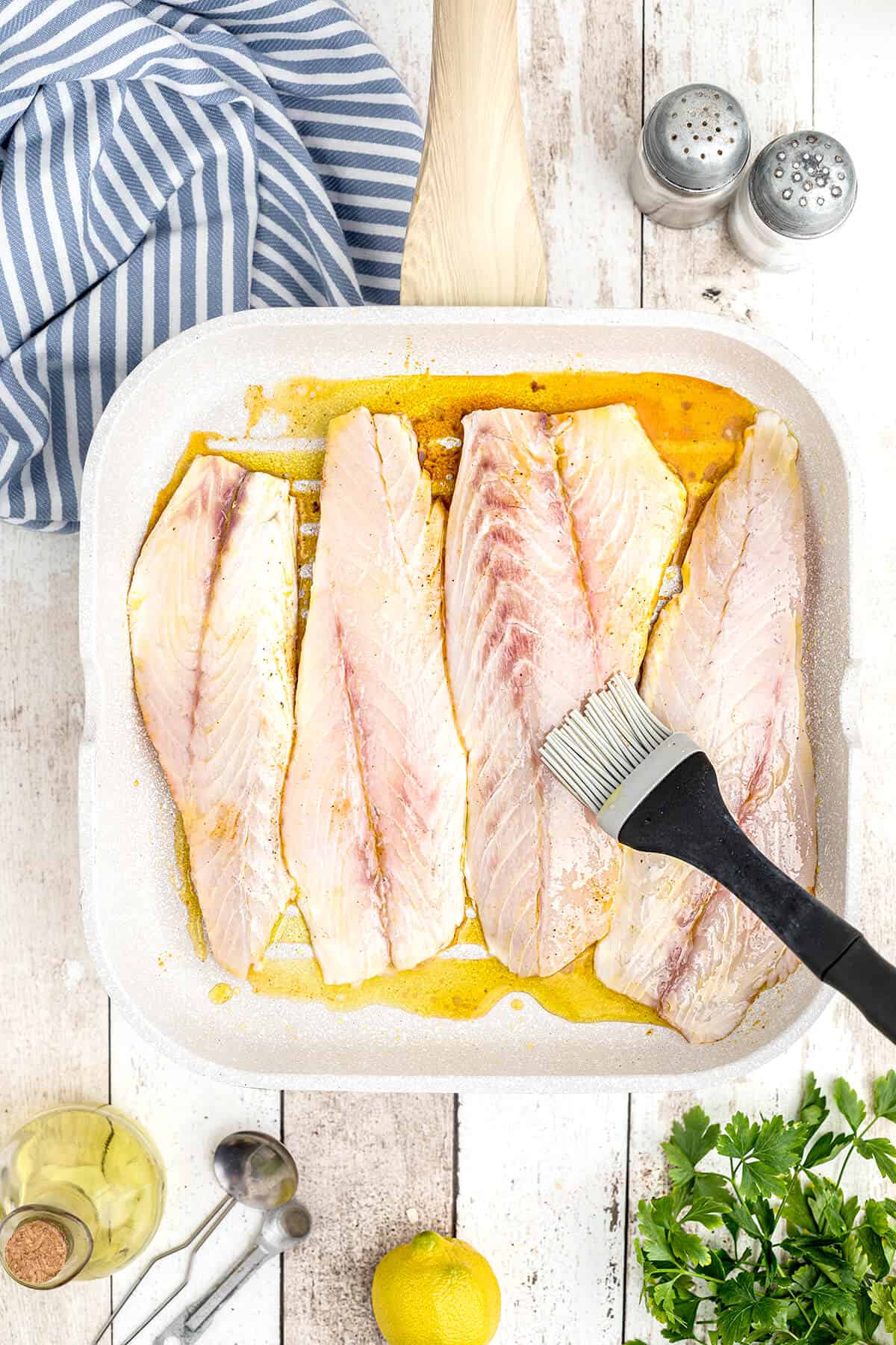 Fish fillets on a grill pan.