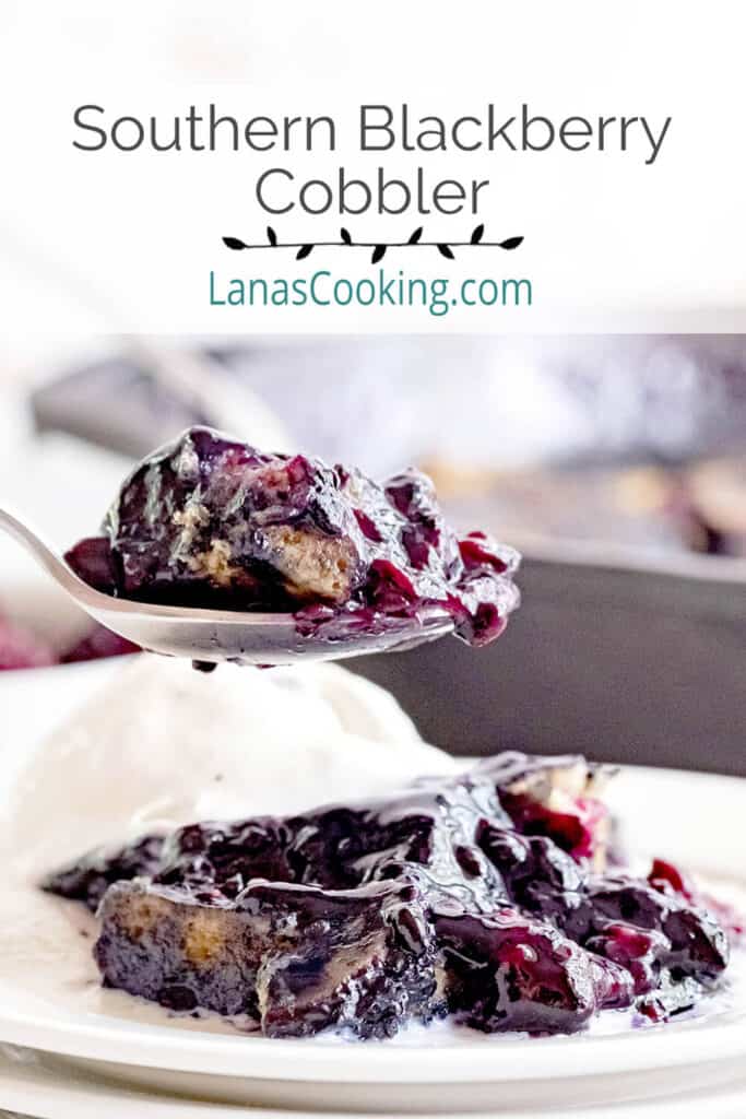 A spoonful of blackberry cobbler with vanilla ice cream.