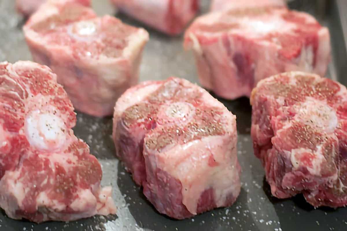 Beef oxtails seasoned with salt and pepper.