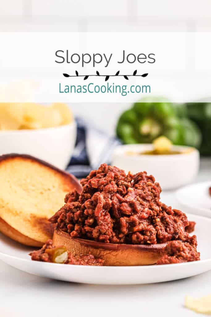 Sloppy Joe sandwich on a white serving plate.