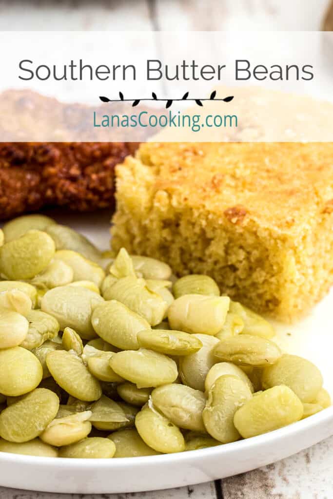 Butter beans on a plate with fried chicken and cornbread.
