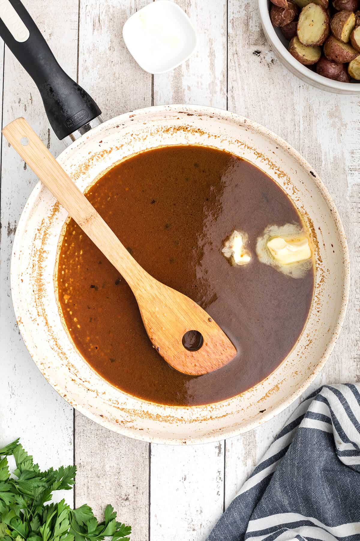 Finishing the sauce with butter.