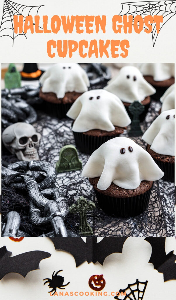 Finished ghost cupcakes on a serving tray.