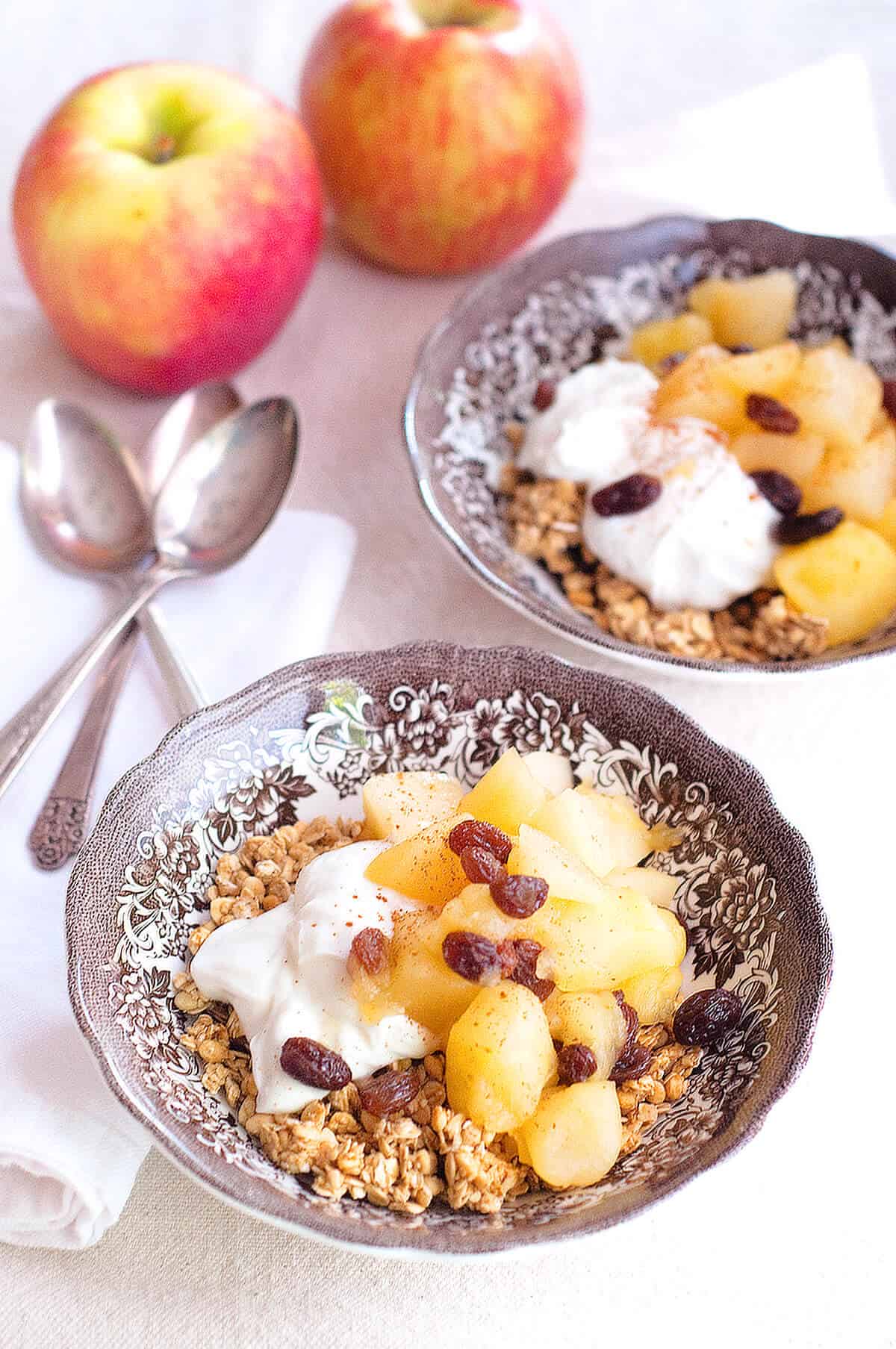 Apple Pear Compote over granola in a serving bowl.
