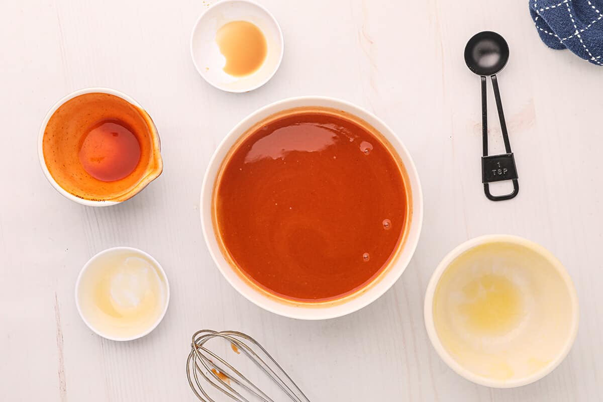 Making sauce for Baked Buffalo Wings Photo collage showing the ingredients for the sauce.
