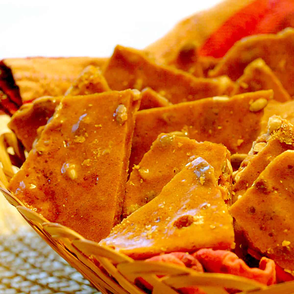 Cinnamon Pumpkin Seed Brittle in a basket.