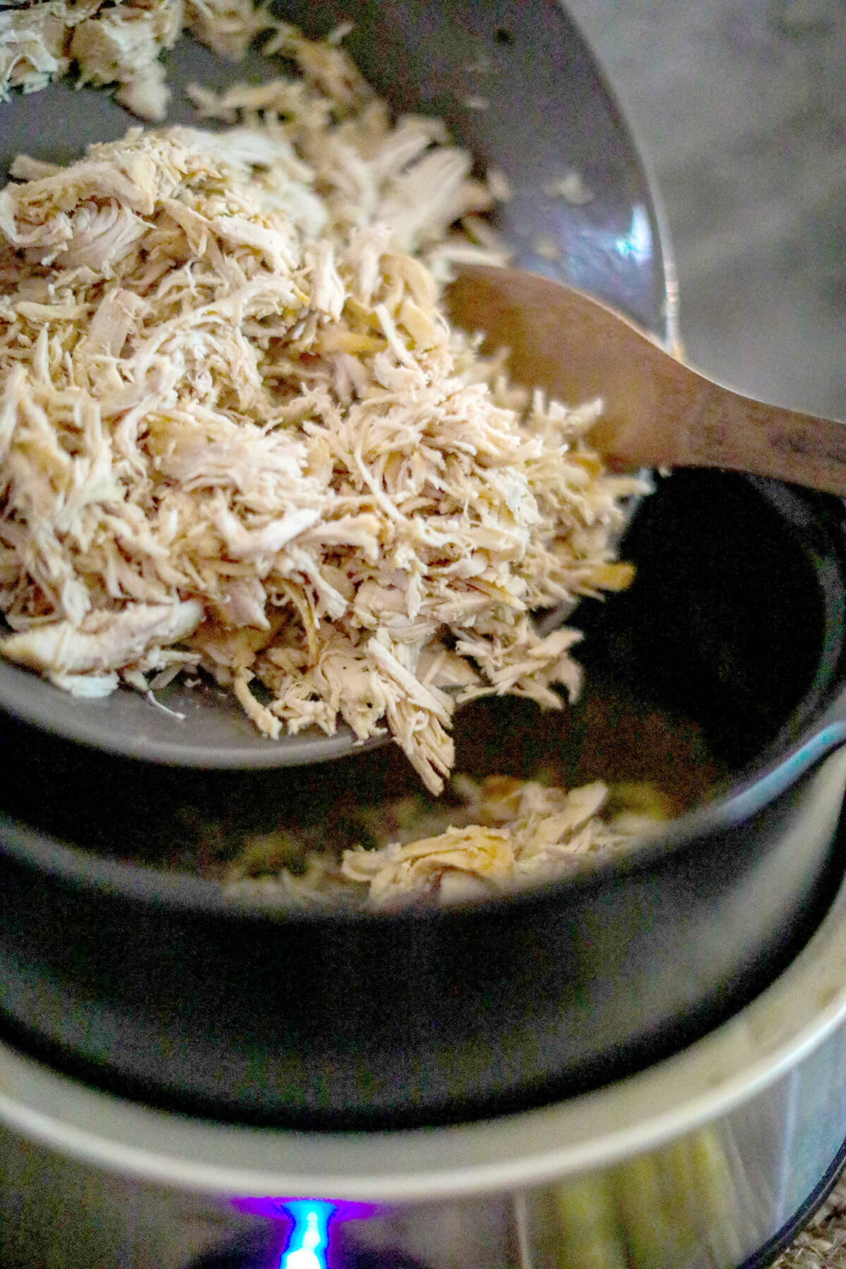 Shredded chicken in a bowl.